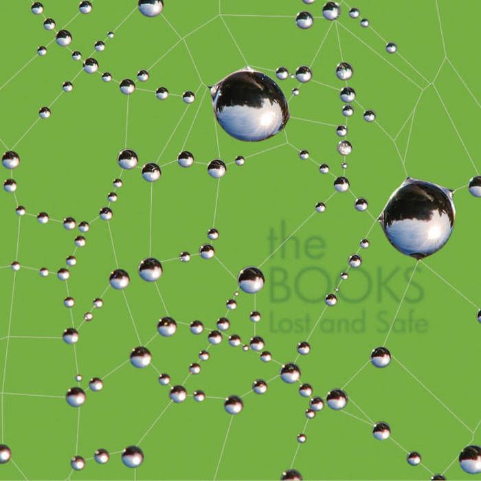 album cover for the Books album "Lost and Safe", featuring water droplets in something that resembles a spiderweb.
