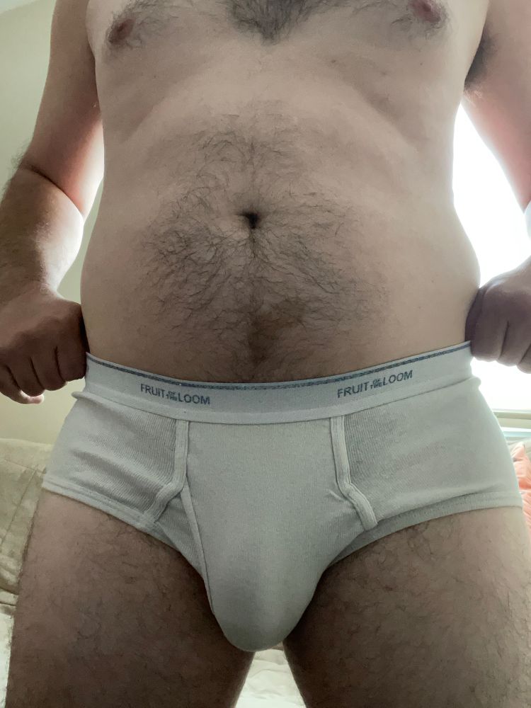 Photo of me standing in white briefs with a bulge