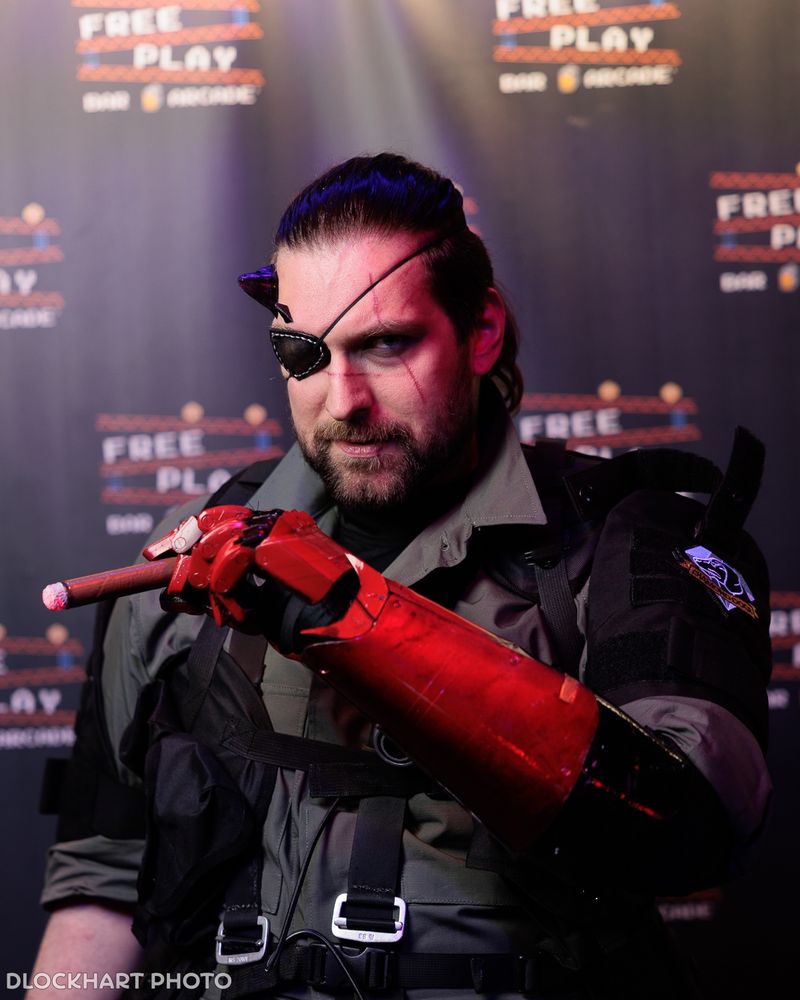A man cosplaying as Venom Snake from Metal Gear Solid V.