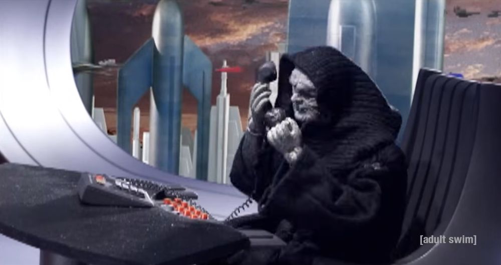 Emperor Palpatine on the phone at his desk and looking more irritable than normal.

There's also a water mark that says [adult swim] cause this is from a Robot Chicken sketch (which is why it's a Palpatine action figure playing the part).