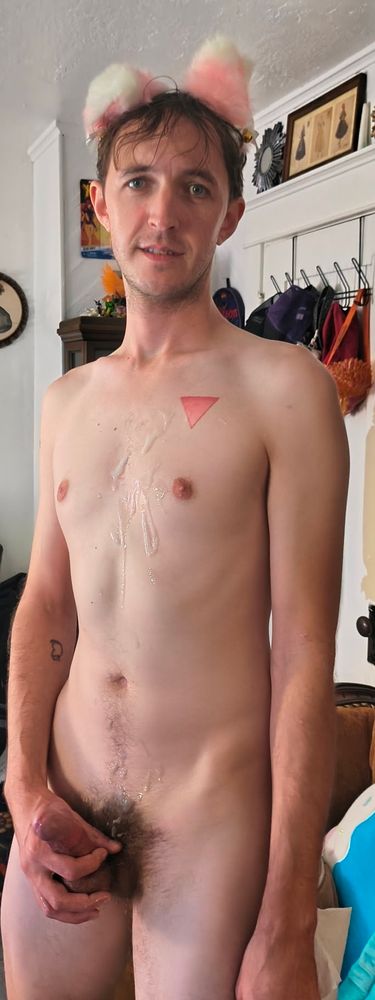 Standing nude with fluffy cat ears on and cum all over my chest 