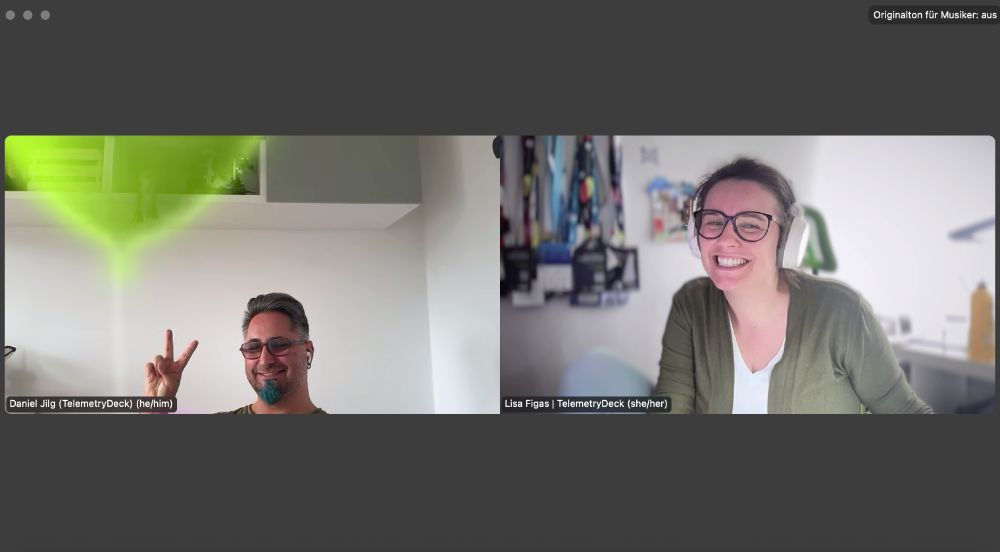 Screenshot from Zoom window with two meeting participants: Daniel and Lis. Both are smiling and having fun toghether.