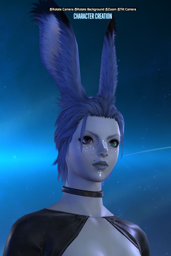 A character creation screenshot of voidbun. He has dark grey skin and a scattering of star-like freckles over his nose and cheeks that practically glow.