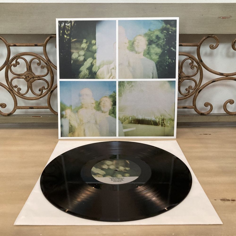 Daniel O'Sullivan & Richard Youngs - "Persian Carpets" LP (vhf#169) - pictured casually on a bench in our foyer. Sometimes I sit here to put my shoes on, but these days find it easier if I'm a bit lower, like on the bottom step of the stairs around the corner. There's some good things about aging, but having a hard time putting your own shoes on isn't one of them. I don't know why I take pictures of the records here, but at least it's not some AI-generated simulation. Ever listen to Faction Punk on Sirius XM? Sometimes the little icon that is supposed to show the album cover is actually a picture of the jacket with the splatter/etc vinyl sticking out halfway, like you might see on the Target or Walmart websites when you're shopping for your cousin for xmas and wondering if he'd like a $40 splatter vinyl version of some old album that used to be in every 2.99 bin. Anyways.