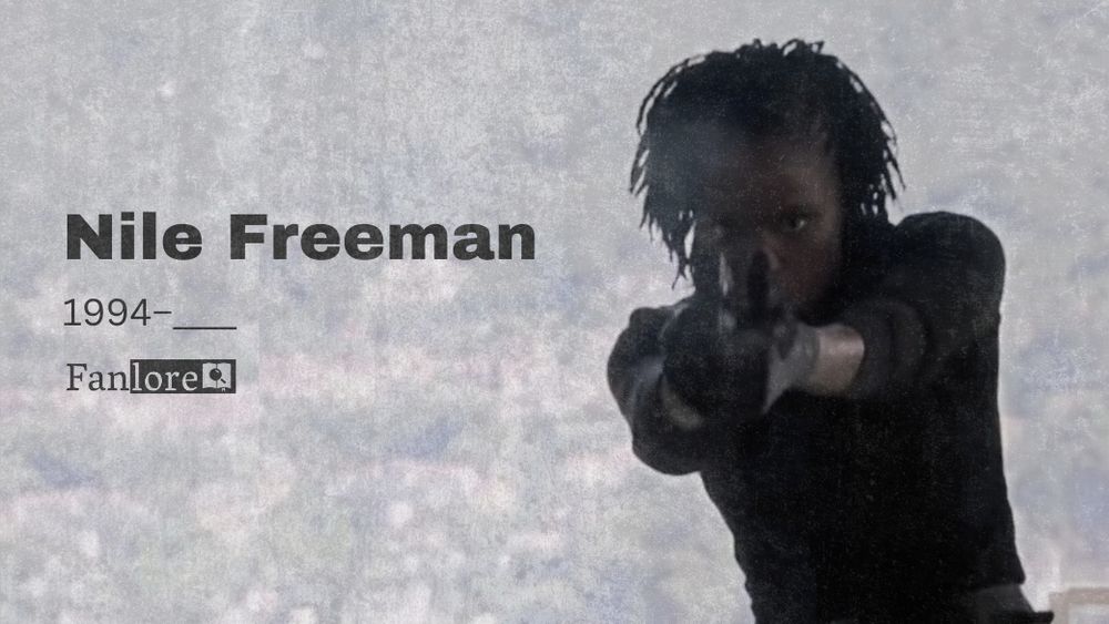 Nile Freeman with a smoking gun aimed at the screen. The text reads “Nile Freeman; 1994–____” above the Fanlore logo.