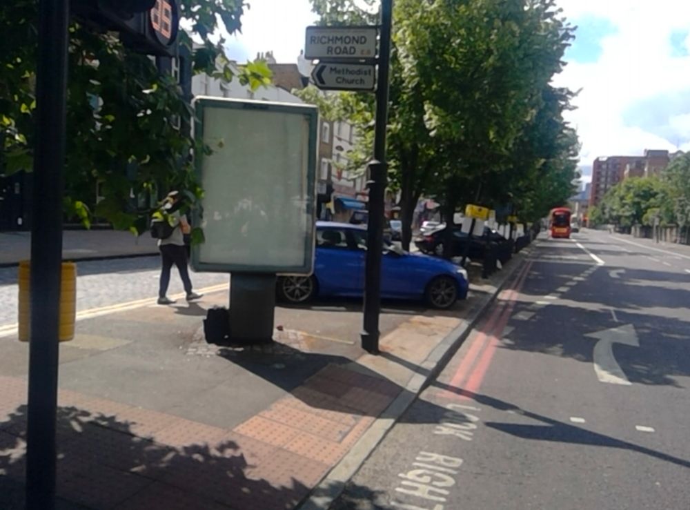 Advertising board on the corner of Kingsland and Richmond Roads