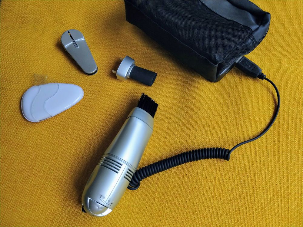 A USB-powered tiny vacuum cleaner to undust one's keyboard.

A child's birthday present to me in another era.