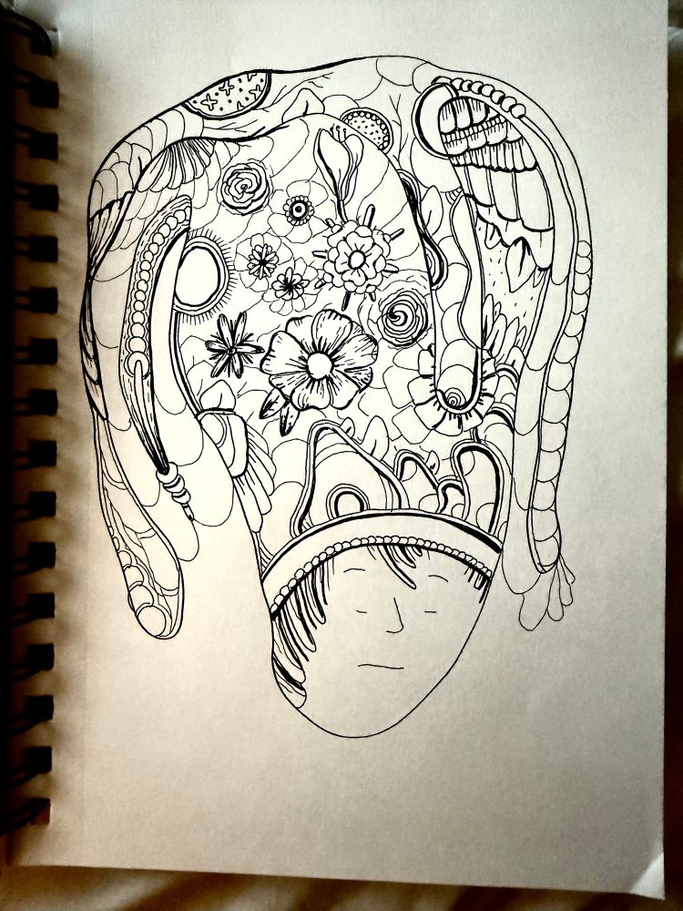 A picture of a sketchbook page. A drawing in black ink of a nonbinary person with some stringy hair coming out of an elaborate hat. The hat has abstract swirls and circles and flowers and long jester-like pieces on top. Their eyes are closed, lost in thought.