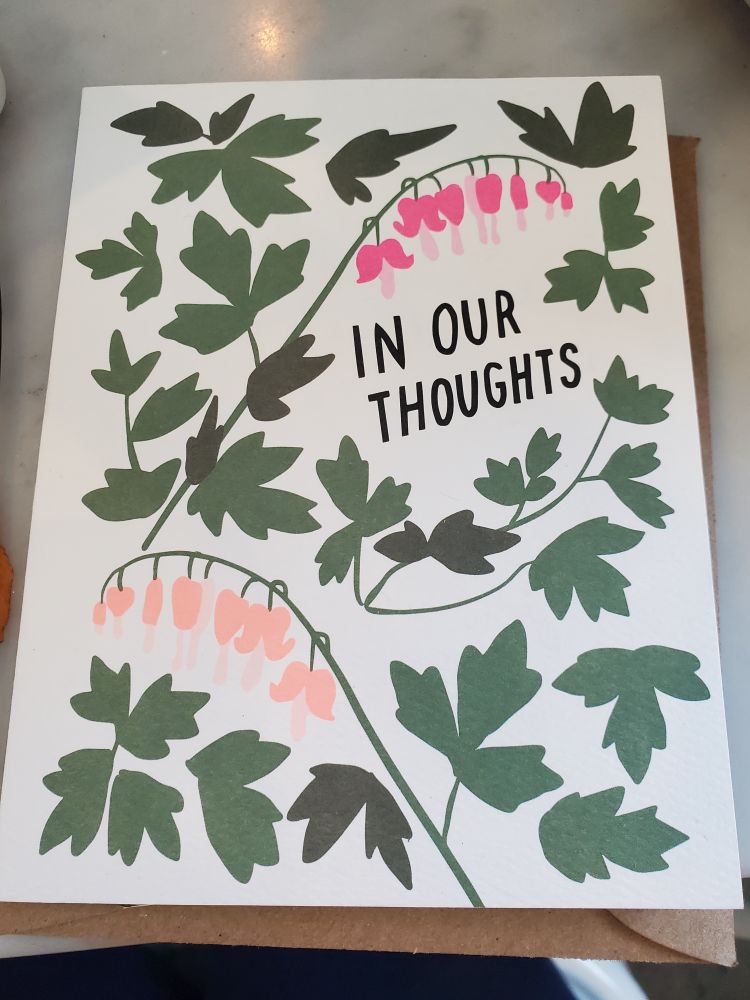 A consolation card, for the passing of my mom. It has green leaves, pink flowers, and says 