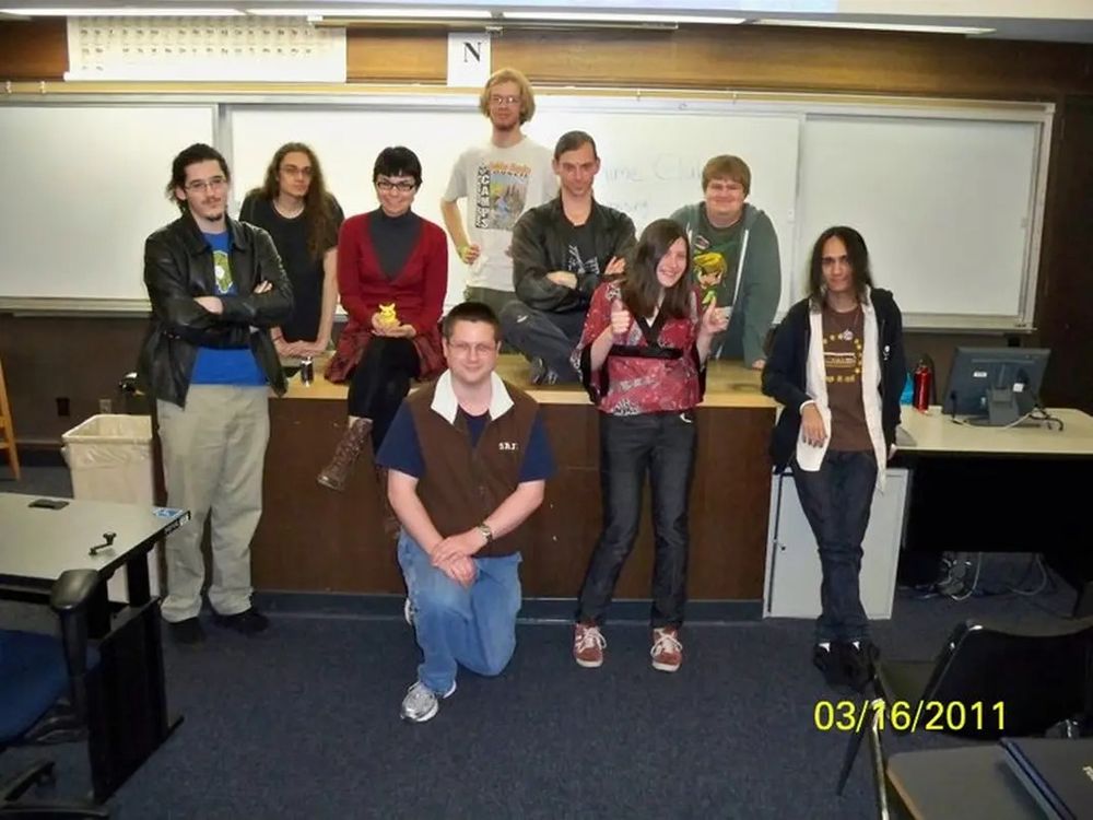 My rag-tag illicit college anime club, meeting in the astronomy classroom