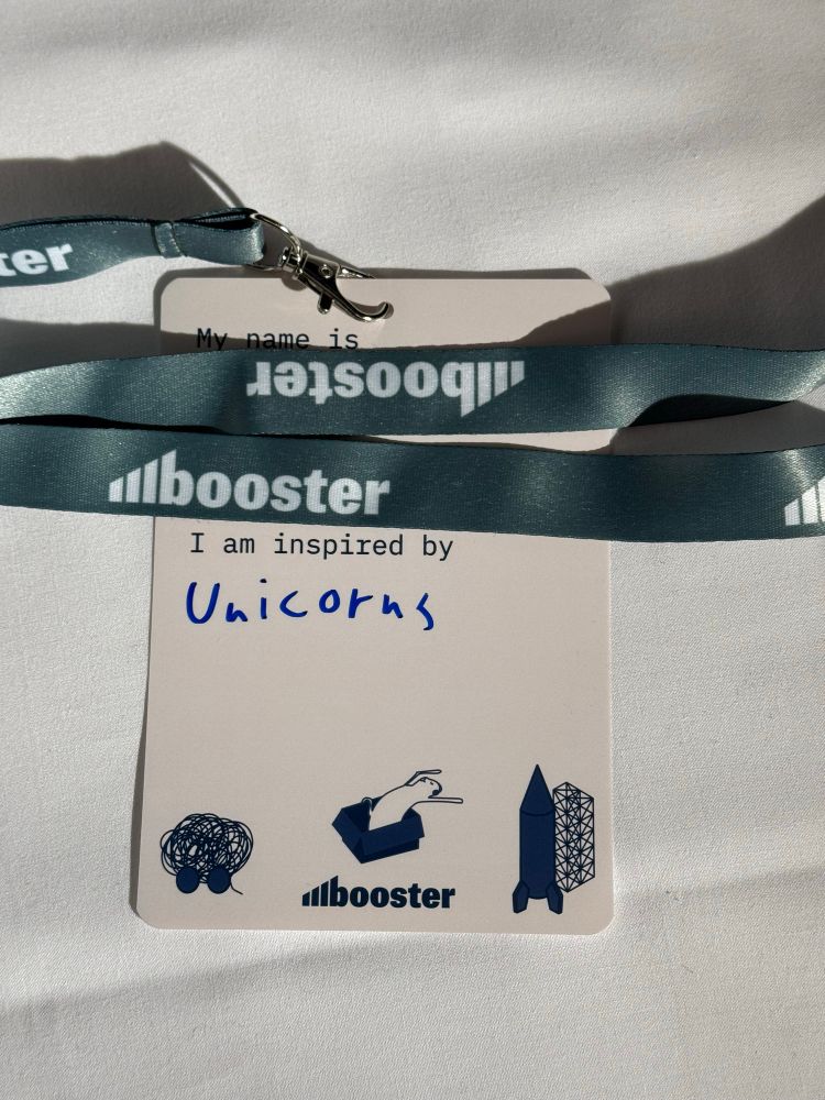 Conference badge for the Booster conference 