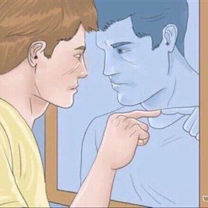 gatwor pointing at himself in the mirror angrily