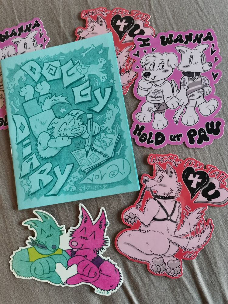 a small comics zine "doggy diary vol 2" and cute vinyl stickers all featuring dog/wolf furry cartoon characters 