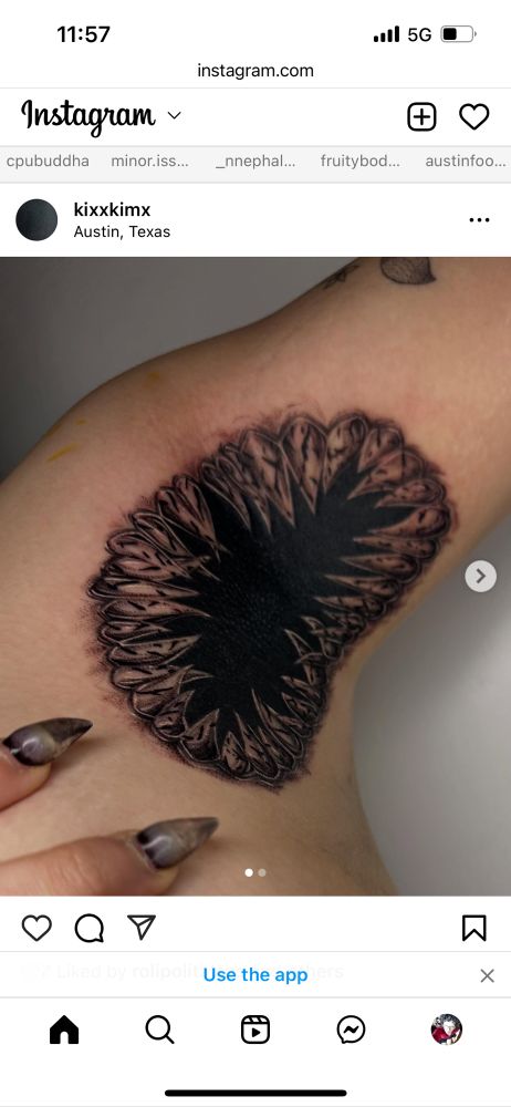 Armpit tattoo. Teeth surrounding a blackout pit. 