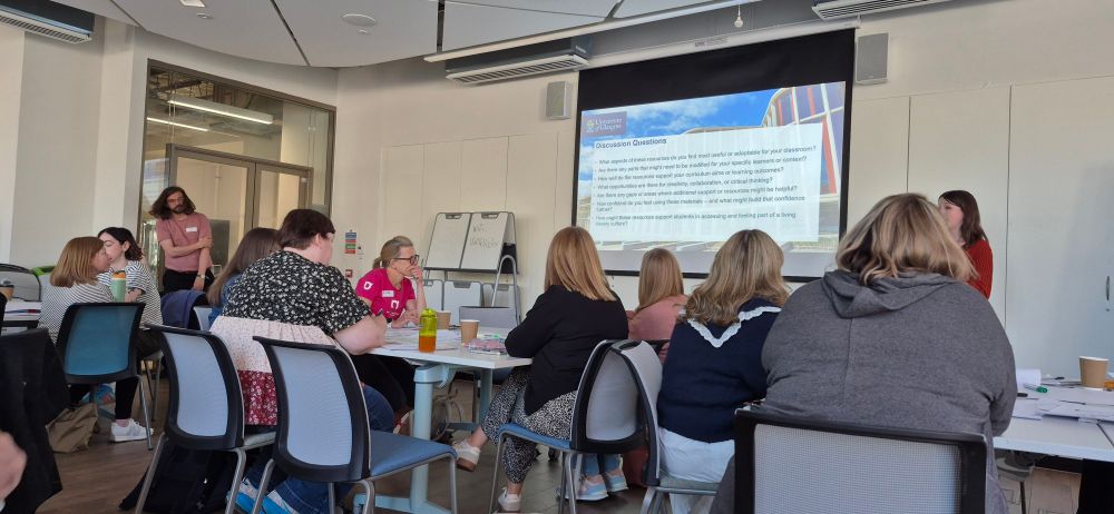 A seminar room full of teachers and academics.
