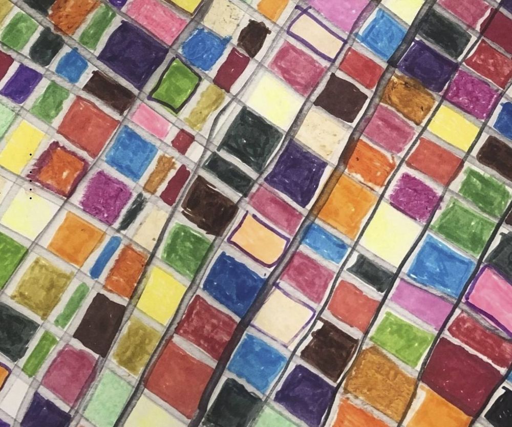 It’s not entirely clear what the image is, though it looks very much like a mosaic grid – except that some of the tiles appear to be coloured with watercolour or marker, and lines appear to have been drawn in black or purple marker; for the most part, the colours are bright hues • “Art Is Collective provides a supported studio environment dedicated to fostering and nurturing the creative ambition and professional development of their artists. Art Is Collective continues to develop, evolve and challenge misconceptions around arts, disability, mental health and participation.    Late Night Art Belfast  6:00 pm – 9:00 pm, Thursday 3 July 2025 • Artist Talk 11:00 am – 12:30 pm, Thursday 10 July 2025    Art Is Collective is a multi-ability, multi-disciplinary group of artists. They meet every Thursday from 10:00 am until 2:00 pm in 2 Royal Avenue to support each other on their artistic journeys. The Collective emerged when artists Ngaire Jackson and Bronagh Lawson observed that some artists…”