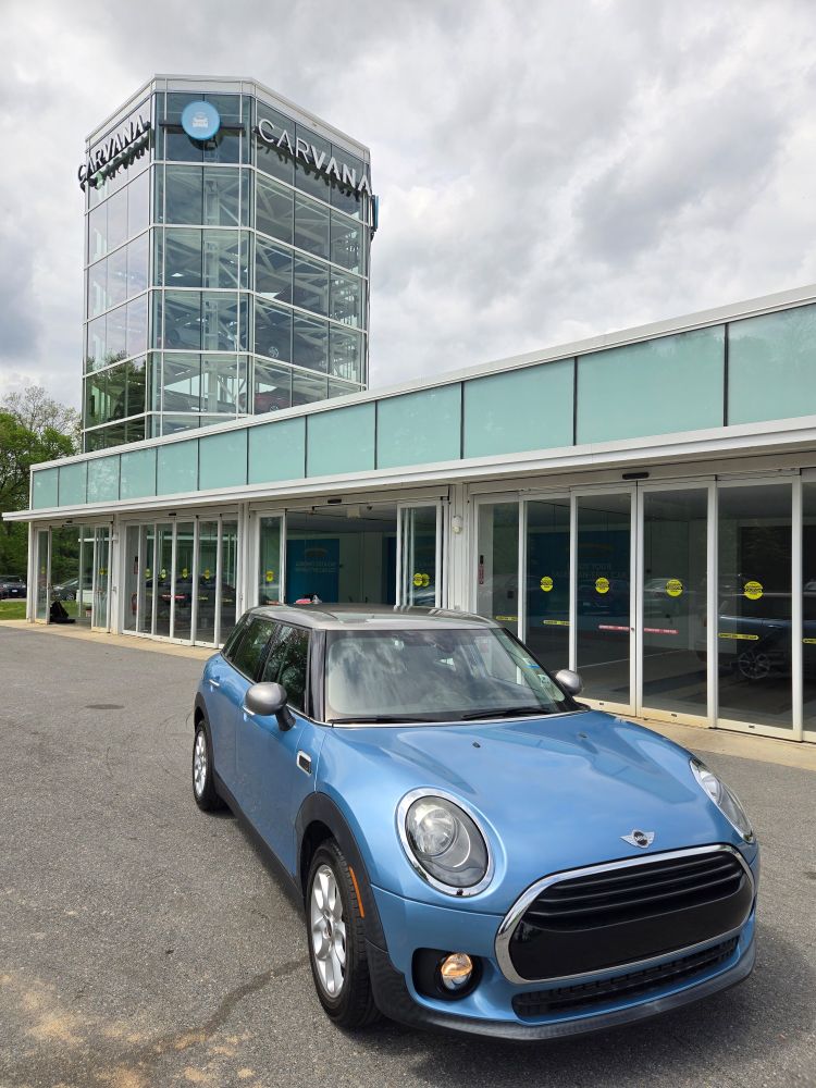 Car in front of a Carvana vending machine 