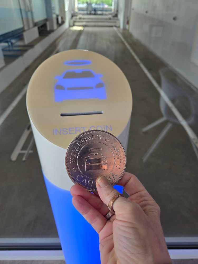 Giant coin to put into Carvana's vending machine 