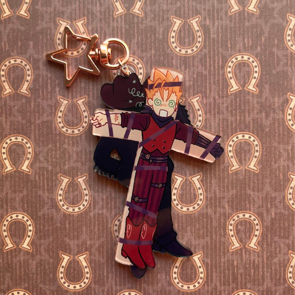 Vash is tied to the back of wolfwoods cross. L 