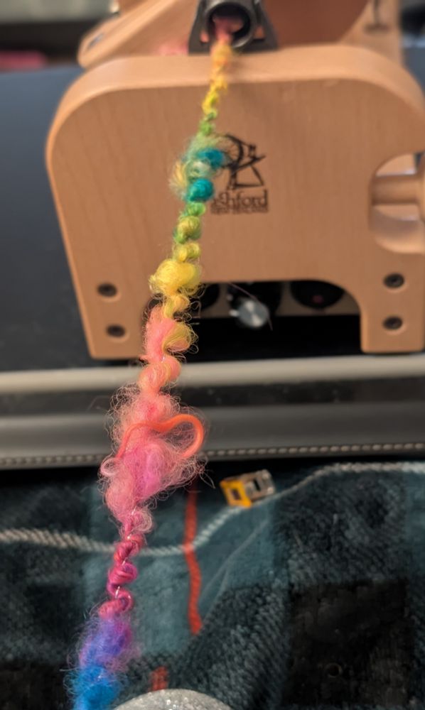 A close up as I was spinning showing the spiral rainbow as it feeds into the wheel. 