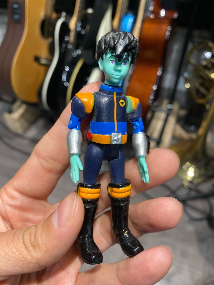 Action figure of young Enzo from Reboot, in his guardian outfit.