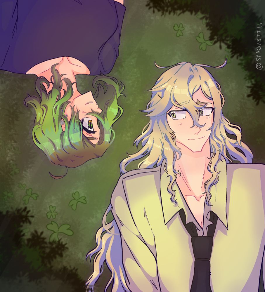 Shiraishi (from collar x malice) and I laying in the grass 