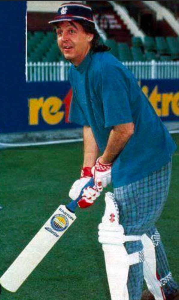 Paul McCartney playing cricket