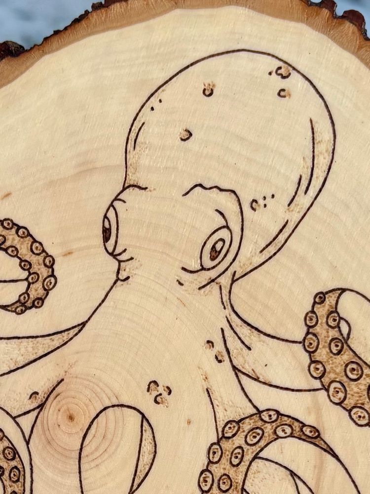 Close up detail shot of octopus pyrography
