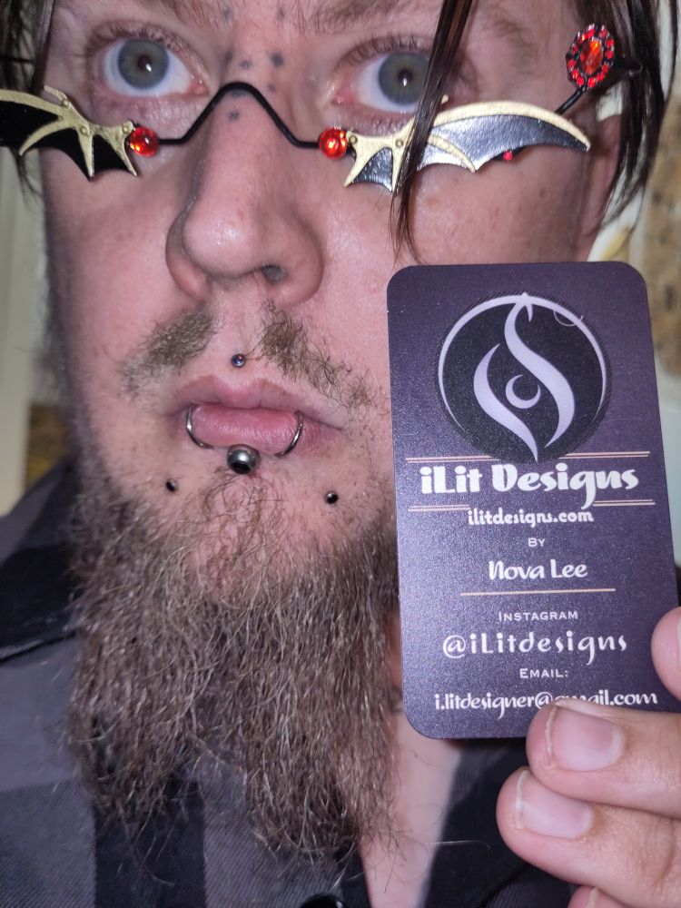Some guy pretending to be a vampire with rad merch from iLit Designs