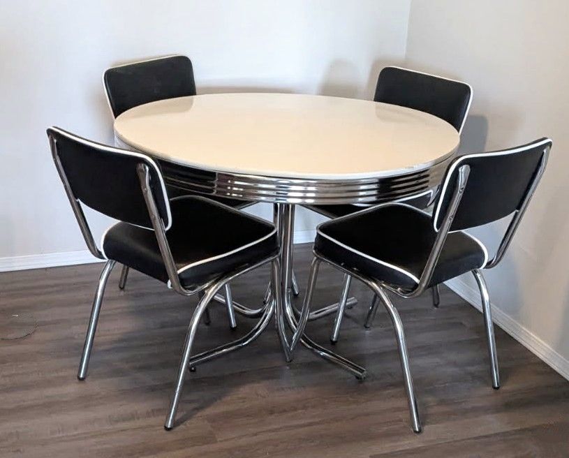 A diner table and four chairs