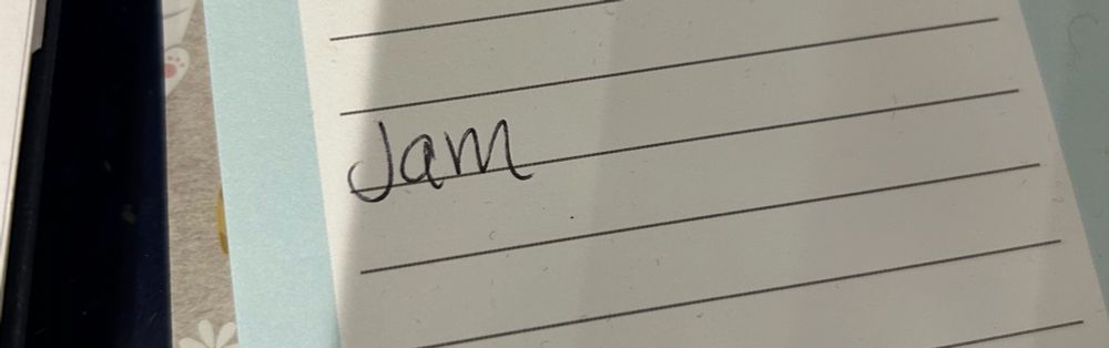 Lined paper with ‘jam’ written 