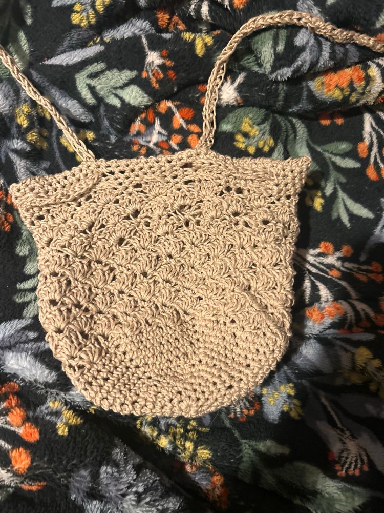 Beige cotton crochet purse. Drawstring pouch construction. 