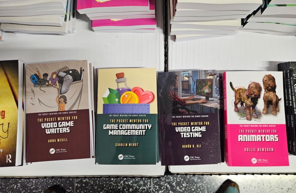 A row of physical books from the Pocket Mentor series from CRC press