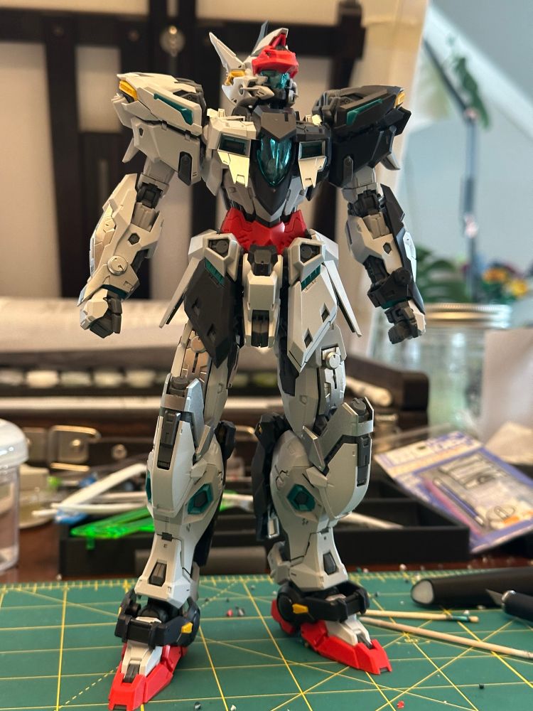 A photo of the full body assembly (head, torso, arms, shoulders, waist, and legs) of the In-Era Thunderbolt 2.0 plastic model kit 