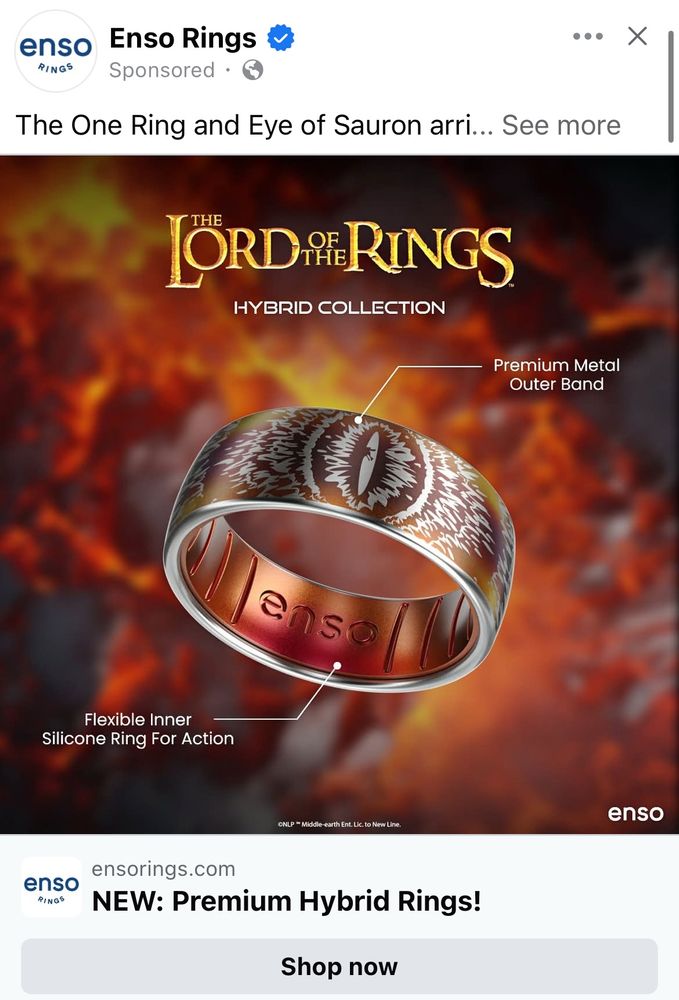 Ad for a hybrid silicone/metal enso ring, showing the eye of sauron in flames on a ring that has metal on the outside and silicone on the inside. 