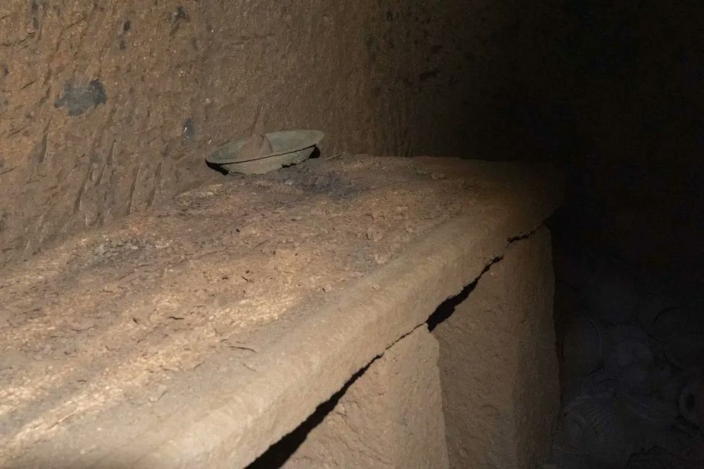 The funerary bed. Remains of the body are still visible.