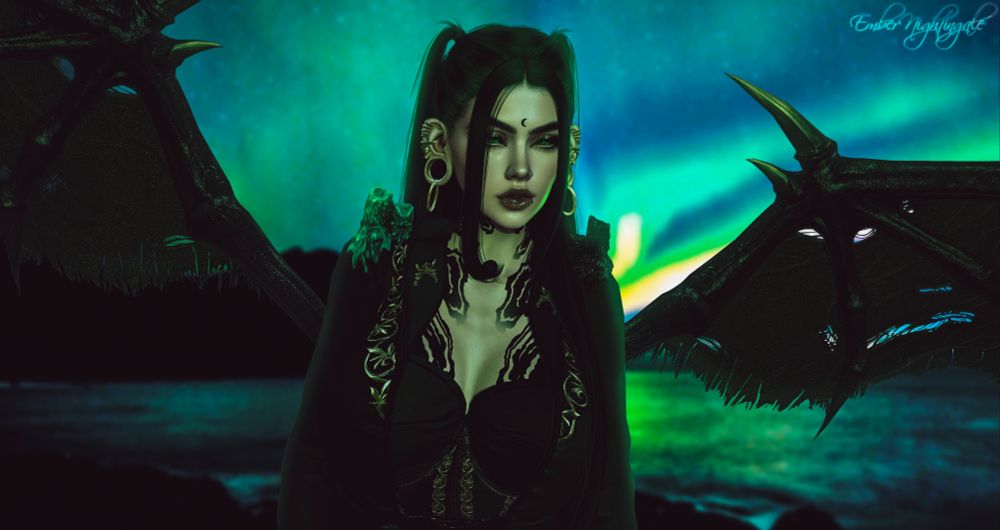 A pale skinned woman, black ink swirling over visible skin stands with tattered and demonic wings spread out behind her. The sky dancing with green and blue hues, lights streaking over the sky. Dark hair with green roots falls around her. She is dressed in two toned attired, black and muted green in equal amount. A jacket draped over her corseted bust, candles sit on each shoulder, the melting wax creeping down onto the jacket. Heavily pierced ears are adorned with rings of various sizes, all in gold. She stares at the camera, green eyes where the green bleeds into the sclera giving her a sinister feel. A faint smirk on her lips as if to say "You asked for this."