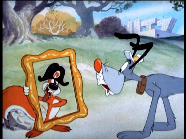 Screwy Squirrel in the Napoleon hat striking the jacket pose holding a gold picture frame in front of himself. Also, there’s a blue dog for some reason