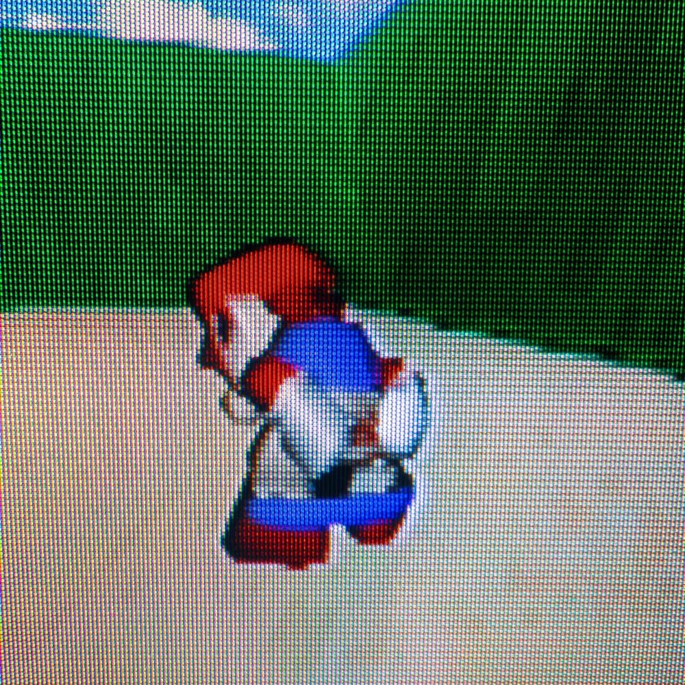 A nostalgic look at the 1996 N64 mega hit, Super Mario 64 on my nostalgic CRT television.

(Mario with his pants down bending over and spreading his asshole in the castle grounds)