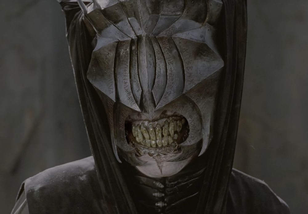 The Mouth of Sauron, a helmeted grotesque beast, blind, but with a prominent and disgusting mouth. It spews lies