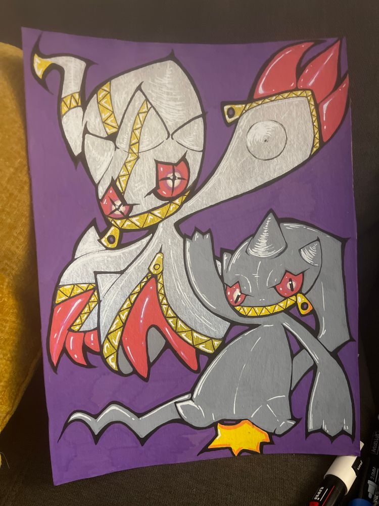 Banette at the bottom with Mega Banette at the top. Has a purple background.