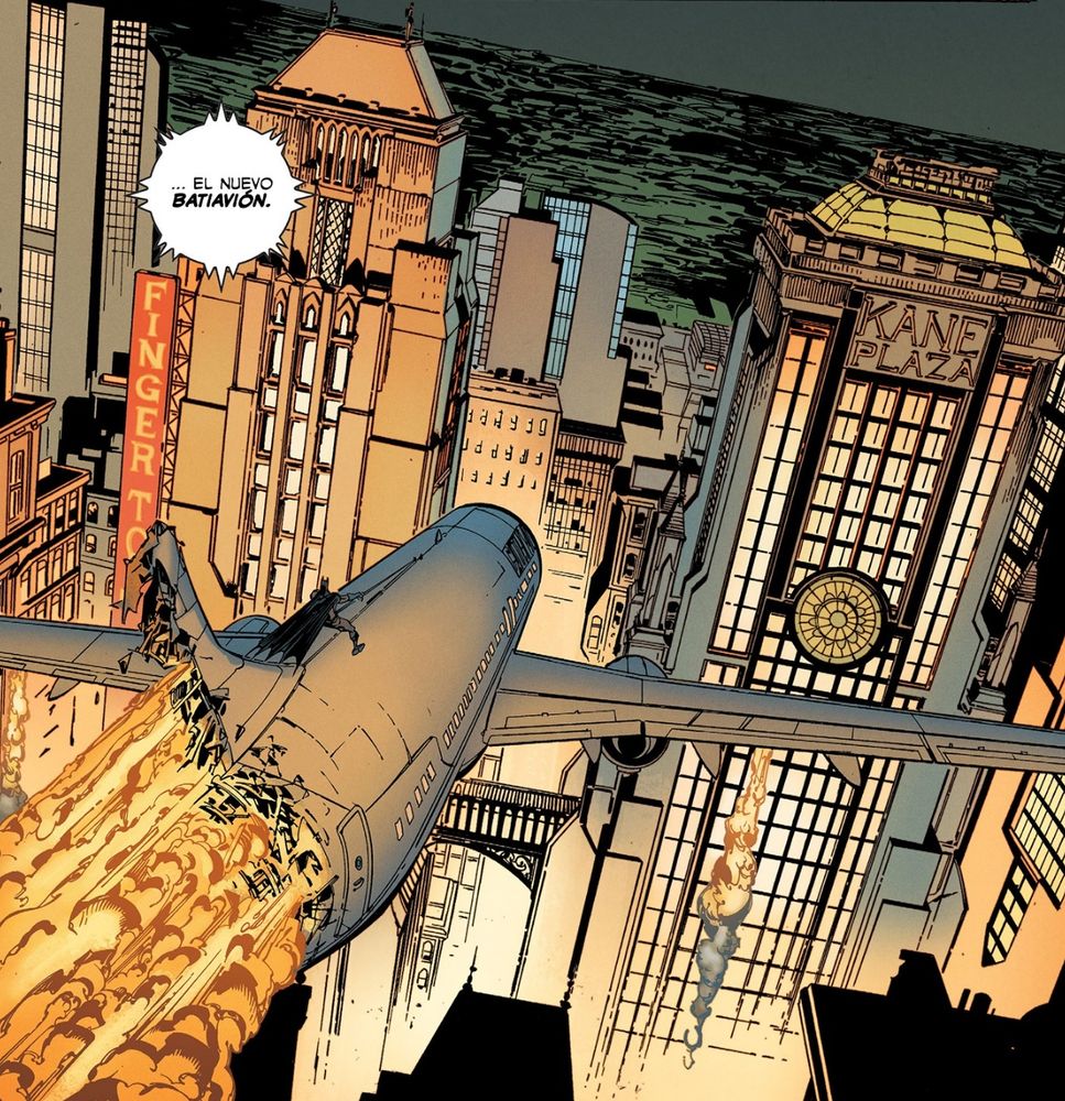 Viñeta en la que Batman esta montado encima de un avión comercial en llamas y lo esta dirigiendo a través de los edificios.