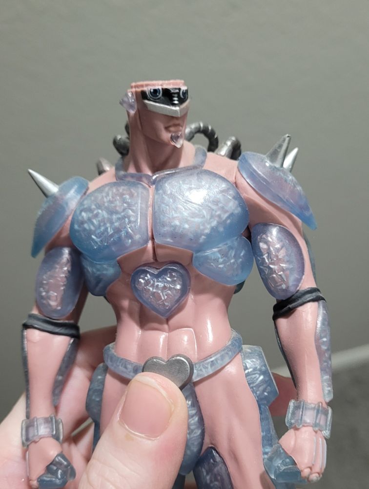 The same Crazy Diamond figure, missing the very top of its head.