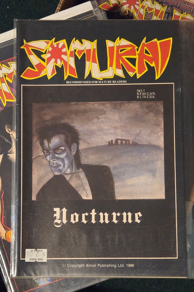 Samurai #7 with a Pat McEown cover,  a moody ink and wash illustration of Peter Murphy  and stone henge in the background