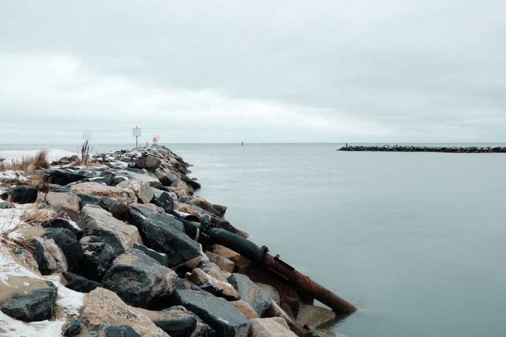 Rudee inlet stones and water.