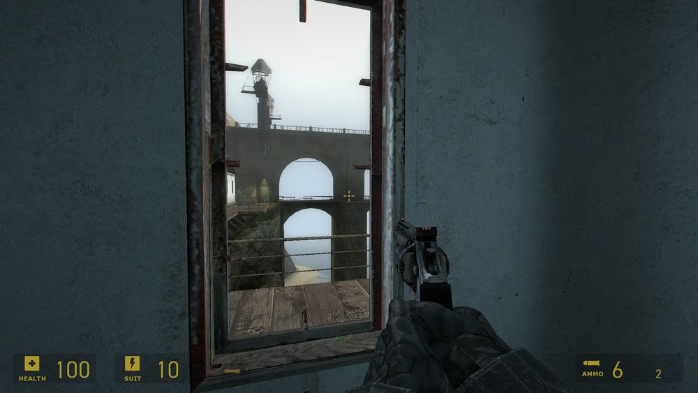 From an abject interior, the supporting arches of a bridge are seen through a window. In coastal fog, the sky is little more than a bleached gradient towards water long receded. All this glimpsed down the sights of a .357 revolver. 