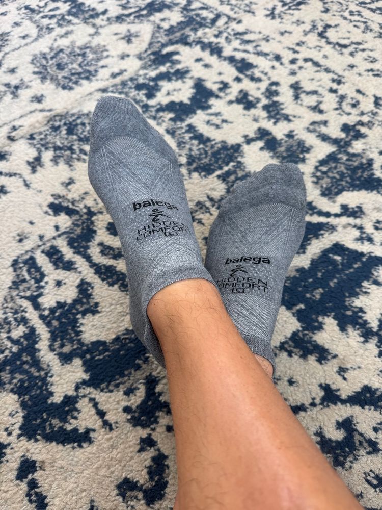 grey balega running socks on my feet