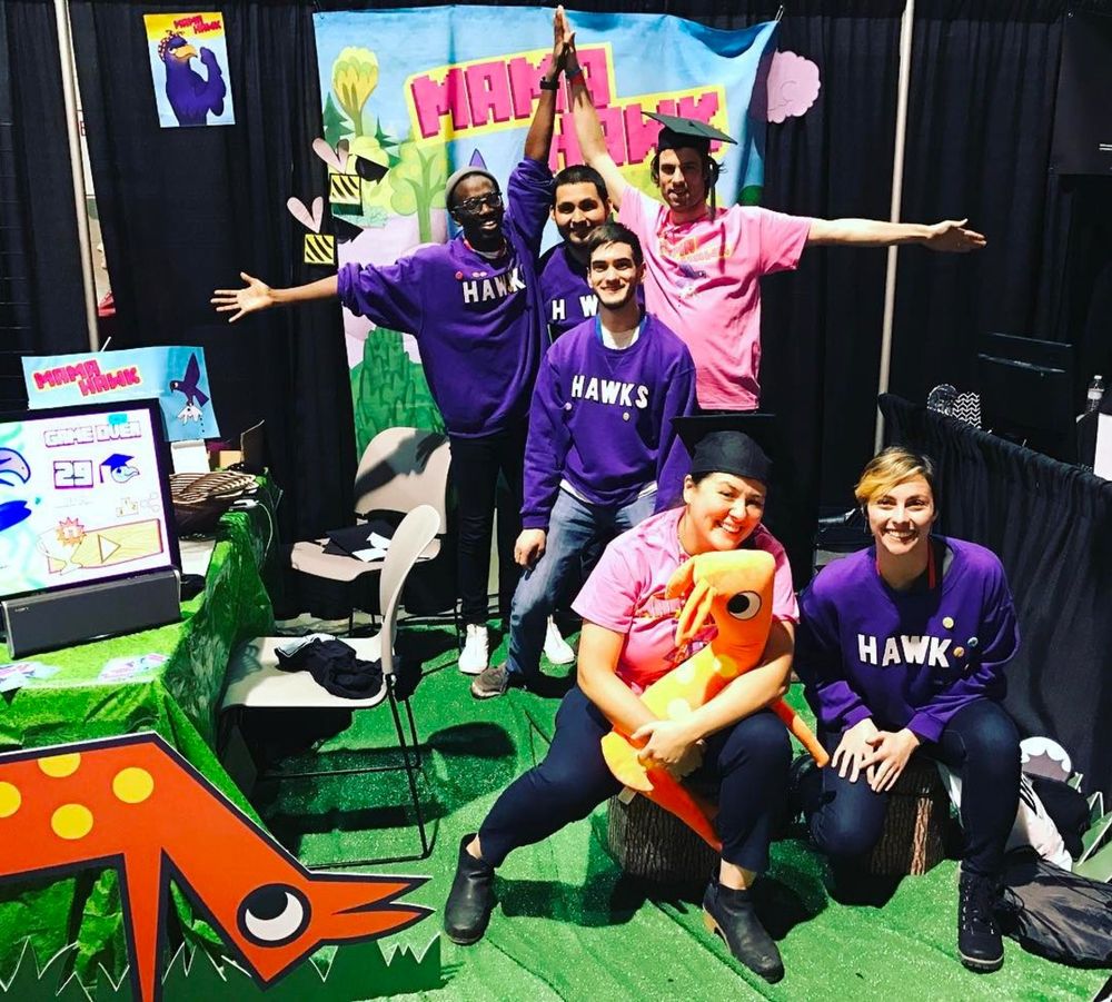 6 game developers at the Mama Hawk Booth during Pax East