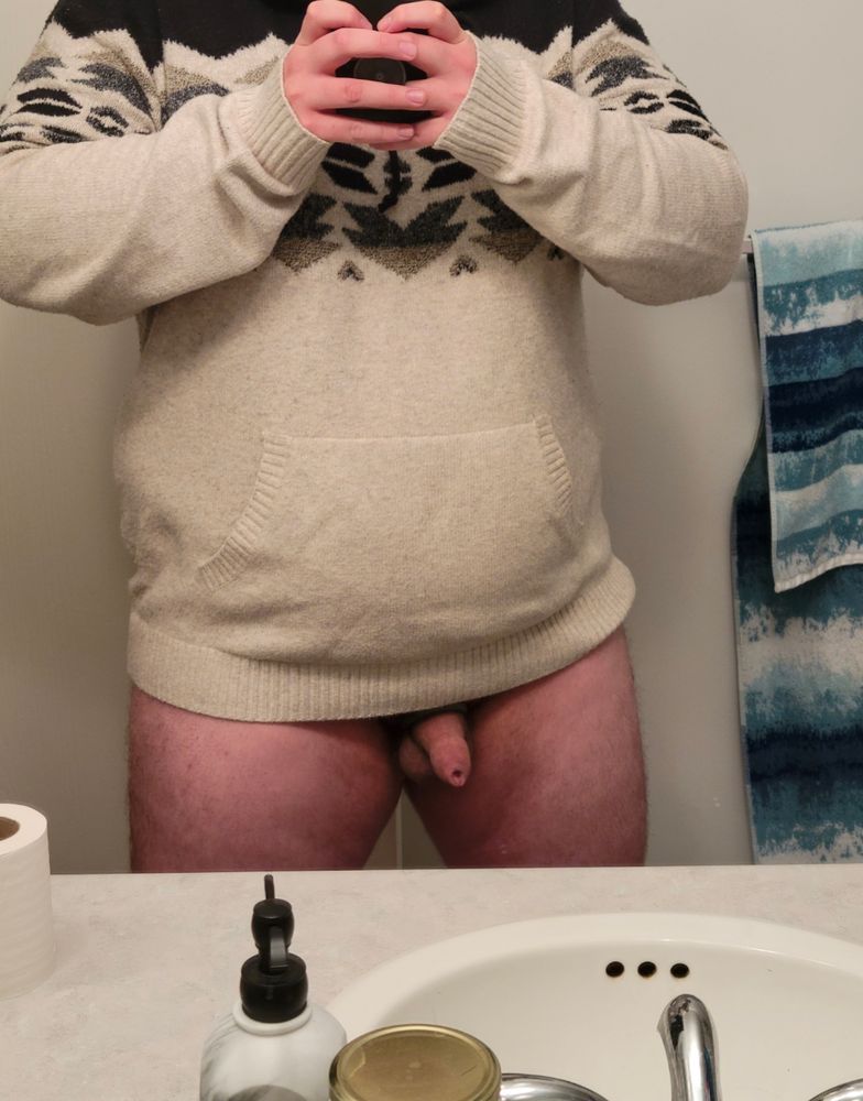 Turbo is wearing a comfy sweater and his cock is sticking out of the bottom