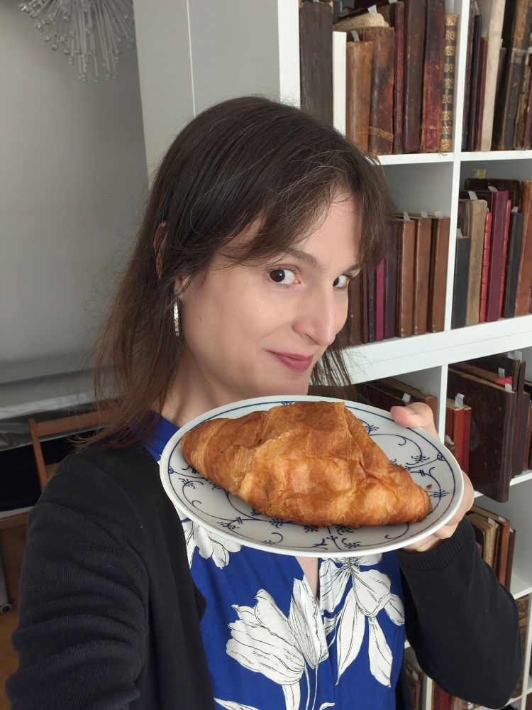 laura with a croissant 